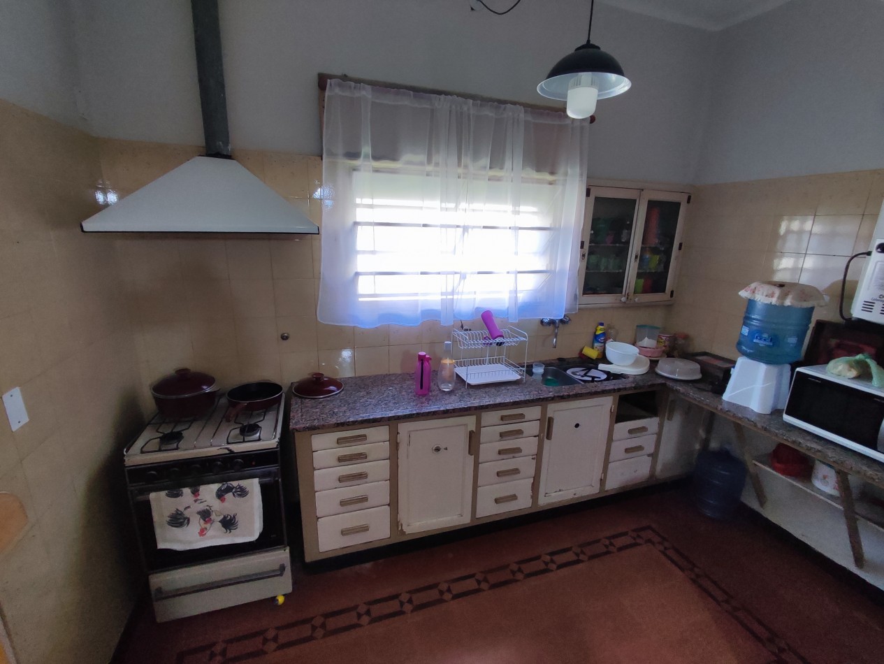 VIVIENDA CENTRICA CON LOTE DE 588M2
